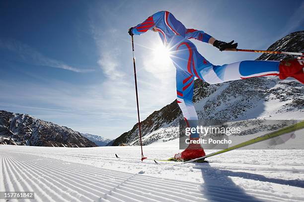man doing cross-country skiing competition - nordic skiing event fotografías e imágenes de stock