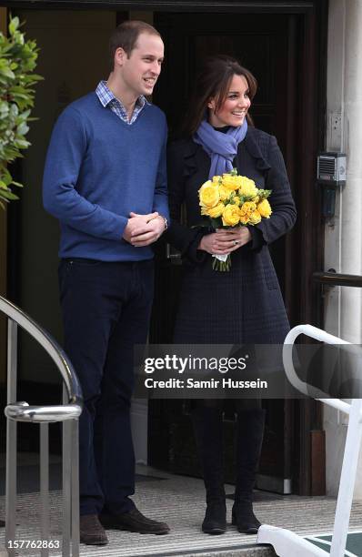 Prince William, Duke of Cambridge and Catherine, Duchess of Cambridge leave the King Edward VII Hospital after she was treated for acute morning...