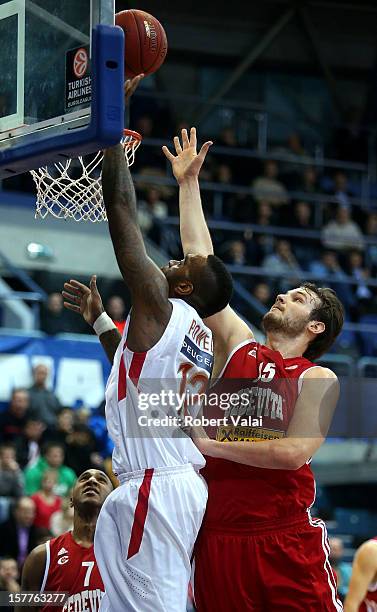 Miro Bilan, #15 of Cedevita Zagreb competes with Powell Josh of Olympiacos during the 2012-2013 Turkish Airlines Euroleague Regular Season Game Day 9...