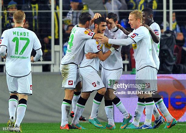 Borussia Monchengladbach's players celebrate their first goal during the UEFA Europa League Group C3 football match between B. Monchengladbach and...