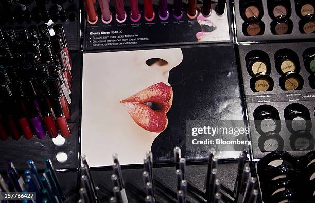 Advertisement for lipstick is displayed among beauty products for sale during the opening of a Sephora SA store at the Riosul shopping mall in Rio de...