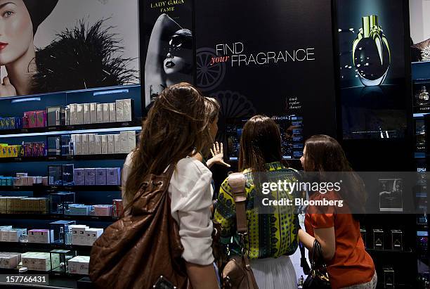 Customers shop for beauty products during the opening of a Sephora SA store at the Riosul shopping mall in Rio de Janeiro, Brazil, on Wednesday, Dec....
