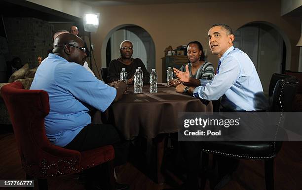 President Barack Obama speaks while visiting a home to discuss his plan to extend tax cuts for 98 percent of Americans December 6, 2012 in Falls...