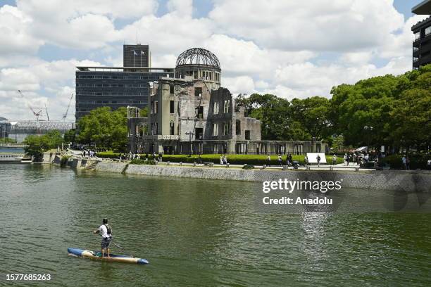 General view of the Hiroshima Peace Memorial as people visit the Peace Memorial Park to pay tribute for the atomic bomb victims in Hiroshima, Japan,...