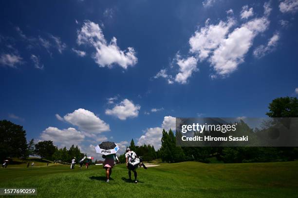 Ai Suzuki of Japan walks on the 18th hole during the third round of Rakuten Super Ladies at Tokyu Grand Oak Golf Club on July 29, 2023 in Kato,...