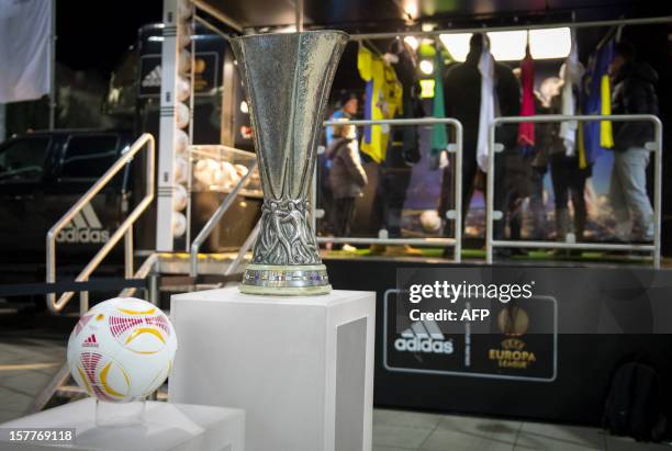 Picture taken on December 6, 2012 shows the UEFA Europa League official trophy set up in front of the Europa League truck parked outside the stadium...