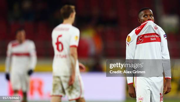 Ibrahima Traore, Georg Niedermeier and Cristian Molinaro of Stuttgart react after the UEFA Europa League group E match between VfB Stuttgart and...