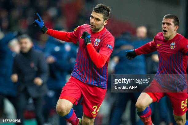 Bucharest's striker Raul Rusescu celebrates scoring during the UEFA Europa League Group E football match FC Kobenhavn vs FC Steaua Bucuresti in...