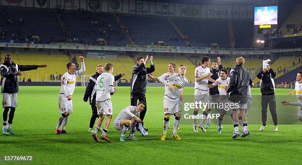 Borussia Monchengladbach's players celebrate after winning the UEFA Europa League football match against Fenerbahce SK on December 6, 2012 at Sukru...