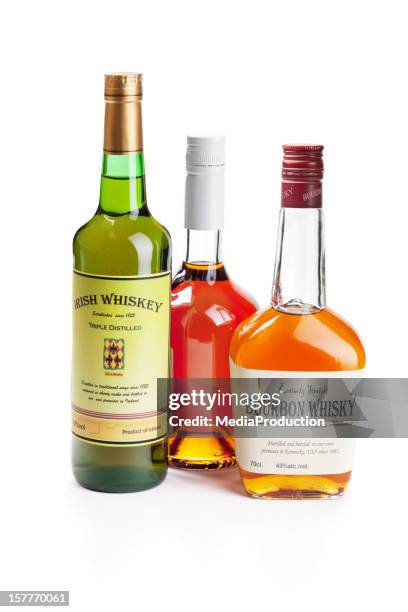 whiskey - lots of bottles stockfoto's en -beelden