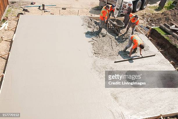 concrete crew - pouring stock pictures, royalty-free photos & images