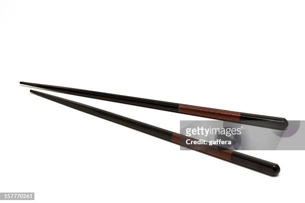 elegant chopsticks - eetstokje stockfoto's en -beelden