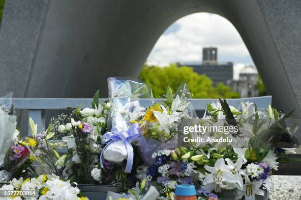 Fowers are seen in front of the cenotaph for the victims of the world's first atomic bombing at the Peace Memorial Park in Hiroshima, Japan, on...