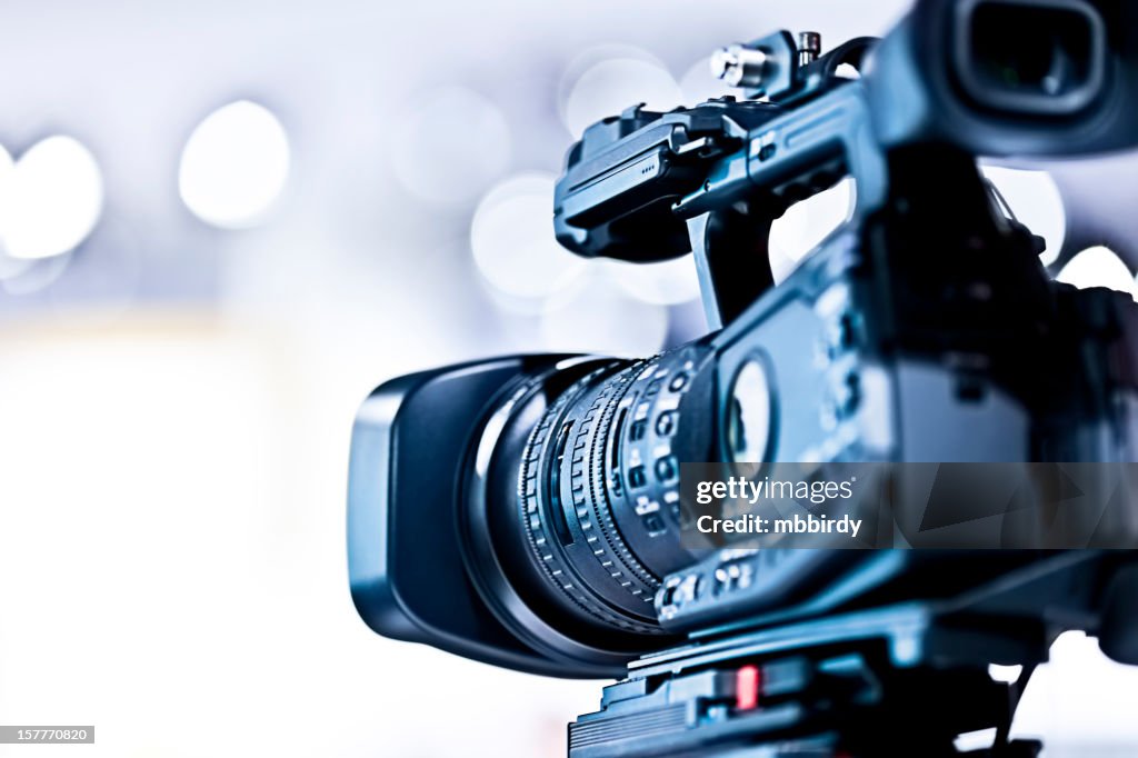 Professional HD video camera in studio