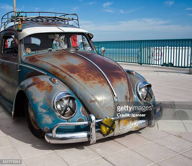 busted vw bettle - daytona beach boardwalk stock pictures, royalty-free photos & images