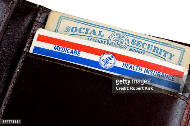 u.s. medicare and social security cards - social security card stock pictures, royalty-free photos & images