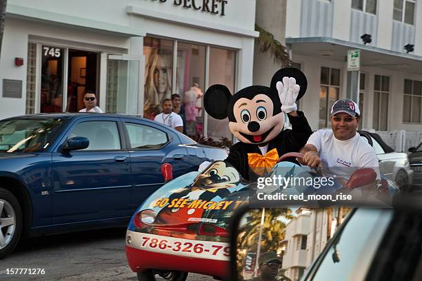 disney world advertisement in miami beach - mickey mouse ears stock pictures, royalty-free photos & images