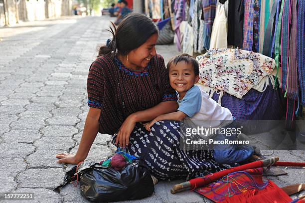 mother and small child in santa catarina poropo,  guatemala - maya guatemala stock pictures, royalty-free photos & images