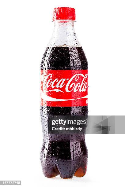 coca-cola plastic bottle isolated on white background - cola stockfoto's en -beelden