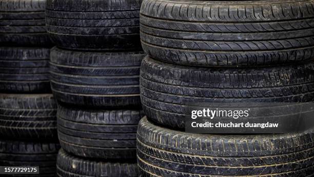 pile of tires old car - tire stack stock pictures, royalty-free photos & images
