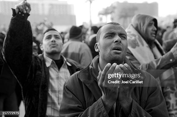 emotion of protestors in egypt's tahrir square - worry free stock pictures, royalty-free photos & images