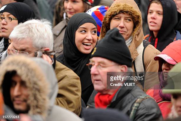 multi-ethnic crowd participating in an anti-racism protest - religion politics stock pictures, royalty-free photos & images