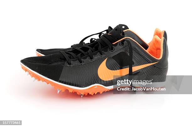 nike zoom victory track spike isolated on white - spikskor för löpning bildbanksfoton och bilder