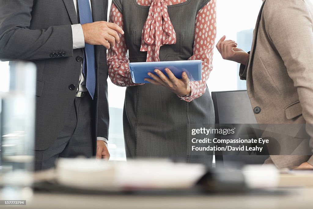 Close up of business people having meeting