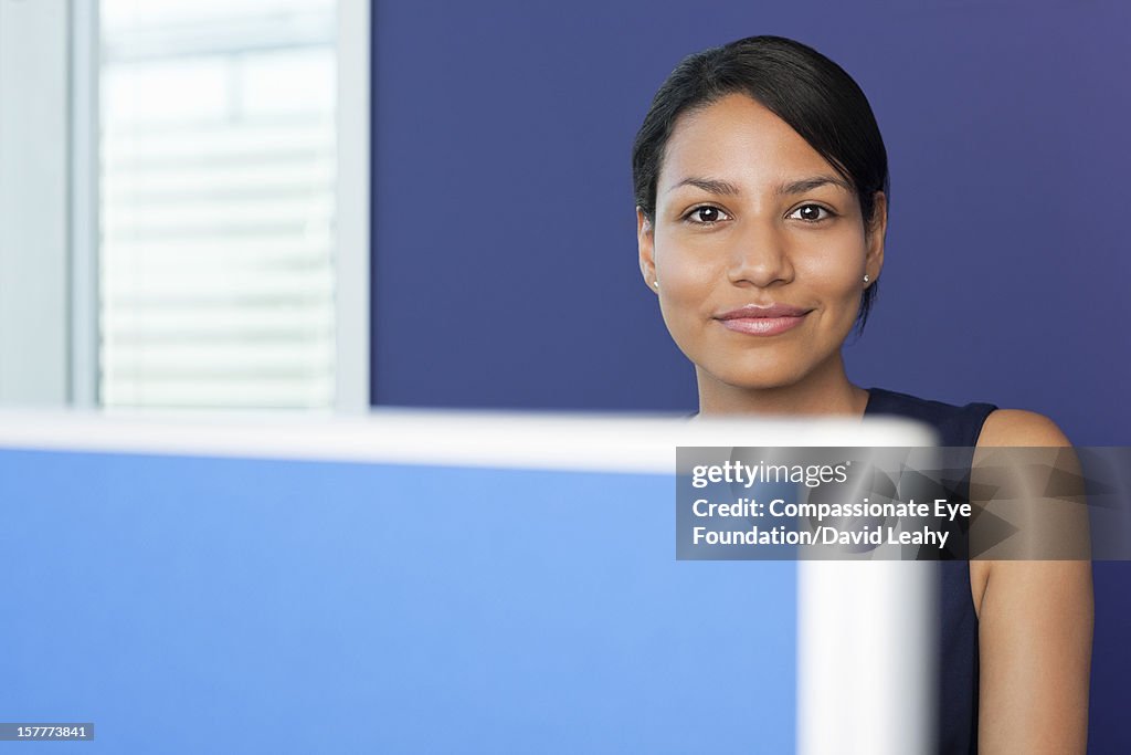 Portrait of smiling businesswoman in office