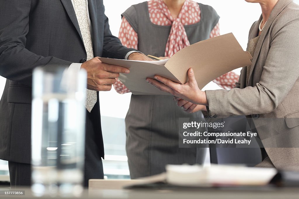 Close up of business people having meeting