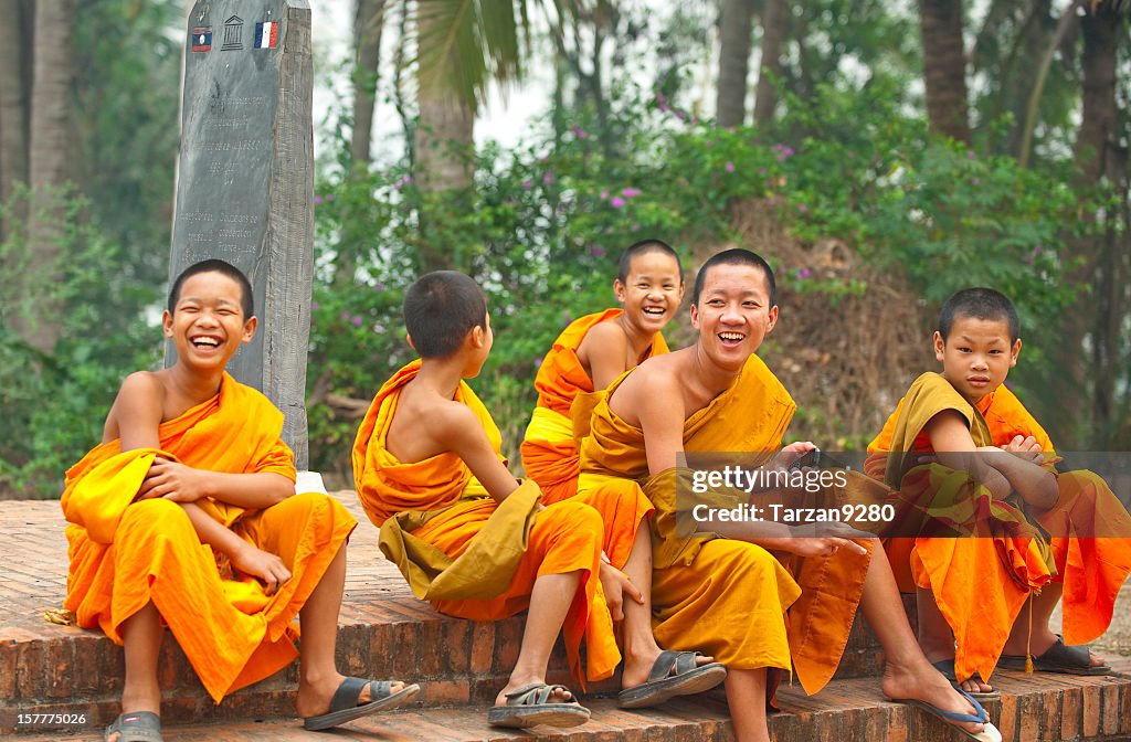 Group of young monks laughing, Laung Prabang, Laos