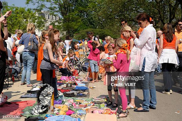 flea market for children in the vondelpark on queen's day - koninginnedag stock pictures, royalty-free photos & images