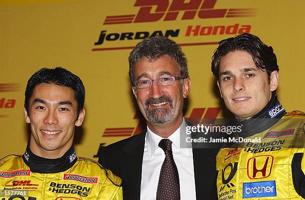 Takuma Sato of Japan with team boss Eddie Jordan and Giancarlo Fisichella of Italy during the launch of the Jordan Honda EJ12 Formula One Grand Prix...