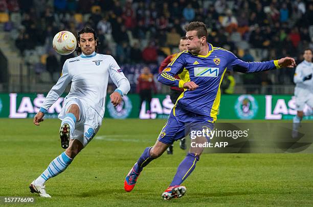 Lazio'sSergio Floccari vies with Maribor's Nejc Potokar during the UEFA Europa League football match NK Maribor vs S.S. Lazio in Maribor, on December...