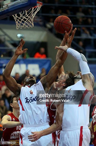 Goran Suton, #14 of Cedevita Zagreb competes with Kyle Hines,#4 of Olympiacos Piraeus during the 2012-2013 Turkish Airlines Euroleague Regular Season...