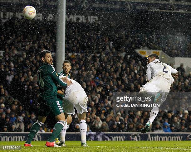 Tottenham Hotspur's US striker Clint Dempsey heads toward goal resulting in an own goal against Panathinaikos during the UEFA Europa League group J...