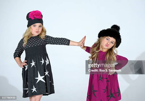 Personalities Eden Wood and Isabella Barrett perform during Eden Wood and Isabella Barrett "LOL" Music video shoot at Picture Ray Studios on December...