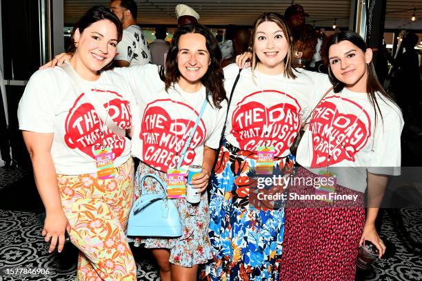 Natalia Ortiz, Montana Miller, Joanie O'Sullivan, and Sol Iriarte wear The Day That Music Cares t-shirts at the Recording Academy DC Chapter Block...