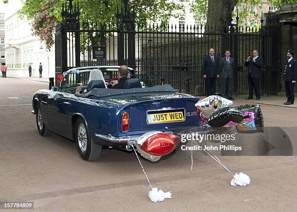 Britain'S Prince William Drives His Wife, Princess Catherine, Duchess Of Cambridge Down The Mall In London, In His Father Prince Charles' Aston...