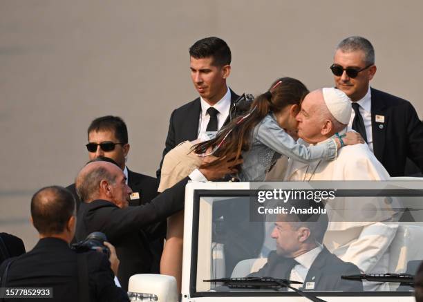 Pope Francis waves to pilgrims at Shrine of Our Lady of Fatima, in Fatima on August 5, 2023 in Ourem, Portugal. For the second time of his...