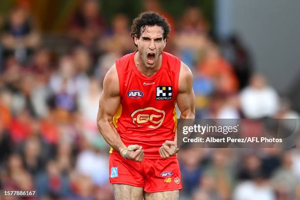 Ben King of the Suns celebrates kicking a goal during the round 20 AFL match between Gold Coast Suns and Brisbane Lions at Heritage Bank Stadium, on...