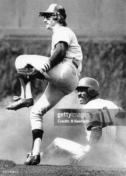 Ivan DeJesus of the Chicago Cubs is tagged out by Chris Speire of the Montreal Expos as he was trying to steal second on April 22, 1979 at Wrigley...