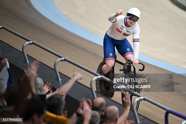 Britain's Jack Carlin celebrates winning his 1/16 Final of the men's Elite Sprint at the Sir Chris Hoy velodrome during the UCI Cycling World...