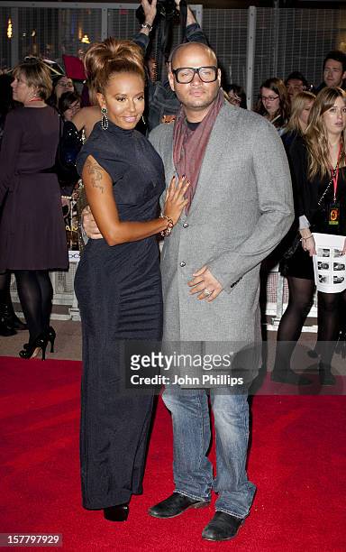 Mel B And Stephen Belafonte Arrives At The European Premiere Of 'The Hunger Games' At The O2 Arena On March 14, 2012 In London.