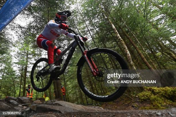 Britain's Harriet Harnden competes in the women's elite mountain bike downhill final at the Nevis Range Mountain Resort, near Fort William in the...