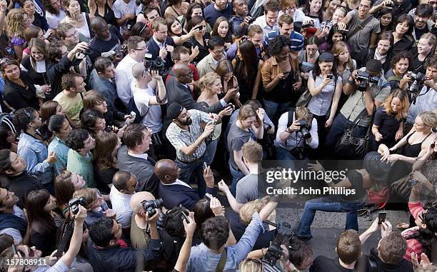 General View Of The Crowd Who Gathered For A Flash Mob Tribute To Michael Jackson Outside Liverpool Street Station In London.