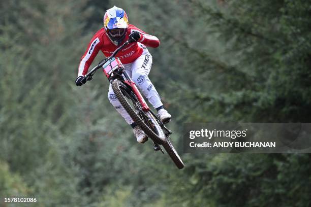 Austria's Valentina Holl takes a jump on her way to victory in the women's elite mountain bike downhill final at the Nevis Range Mountain Resort,...