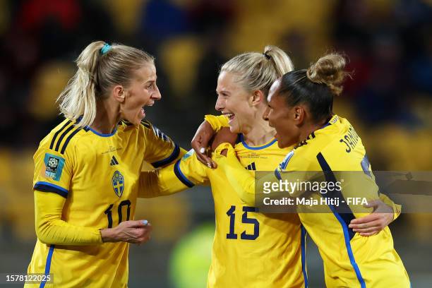 Rebecka Blomqvist of Sweden celebrates with teammates Sofia Jakobsson and Madelen Janogy after scoring her team's fifth goal during the FIFA Women's...