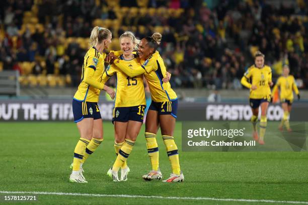 Rebecka Blomqvist of Sweden celebrates with teammates Sofia Jakobsson and Madelen Janogy after scoring her team's fifth goal during the FIFA Women's...