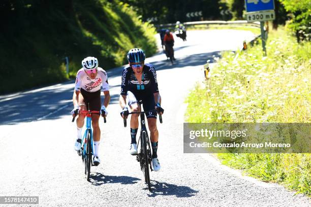 Alex Baudin of France and Team AG2R Citroën Team and Romain Bardet of France and Team DSM - firmenich compete in the breakaway during the 43rd...